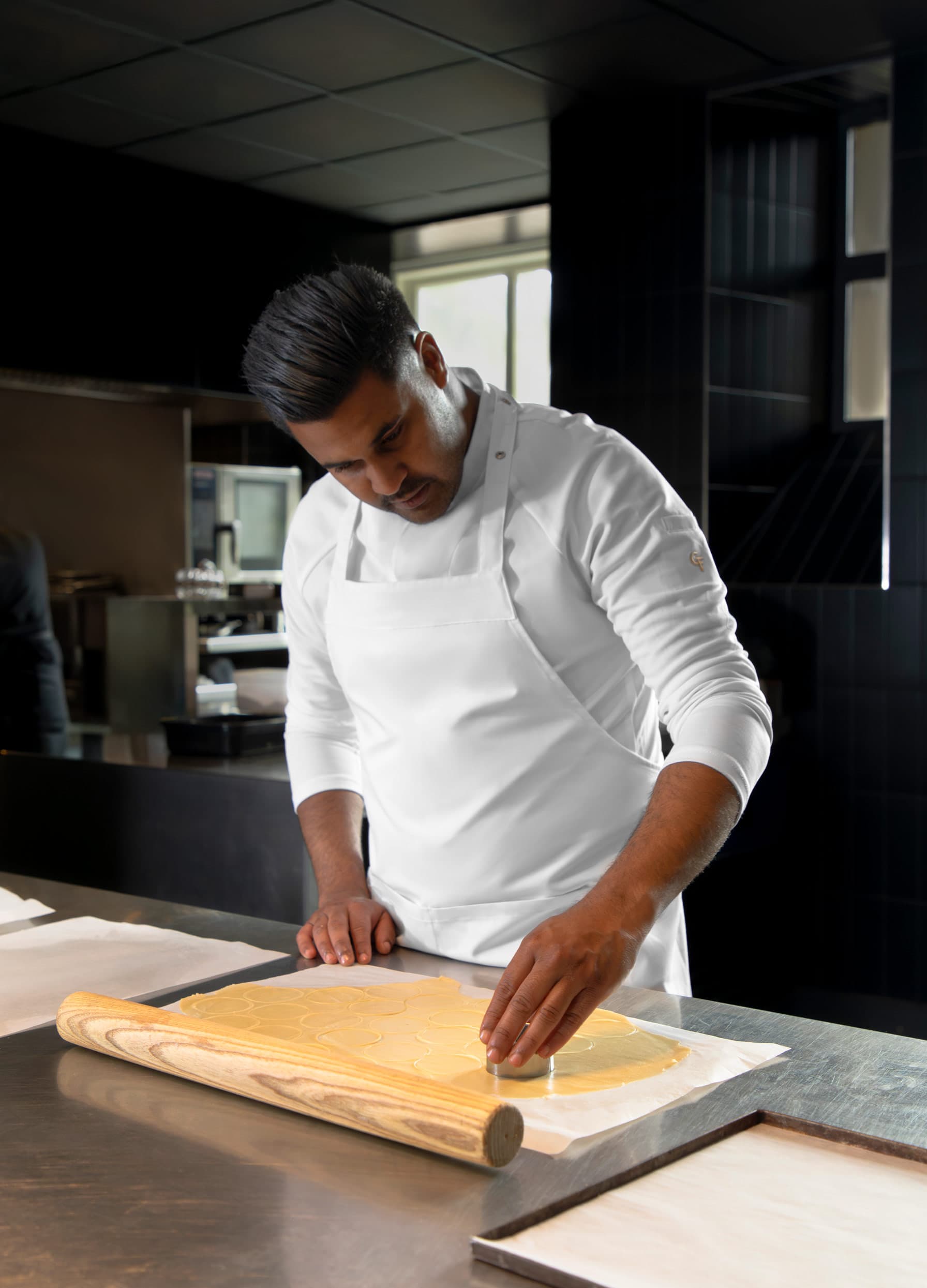 Chef at work in a white Cheffix chef jacket